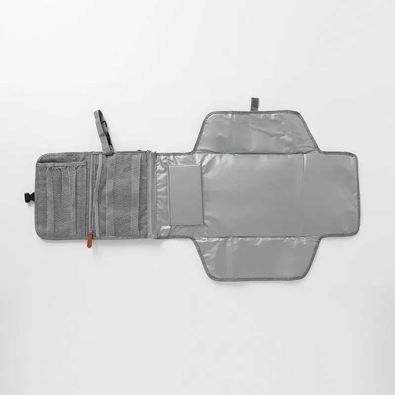 Waterproof grey polyester changing table pad for urinal and incontinence care, one size