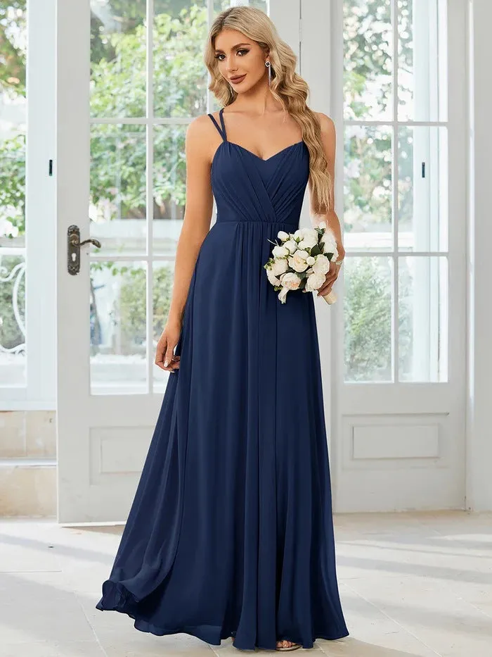 Women's sleeveless A-line long dress with pleated skirt detail in solid colour