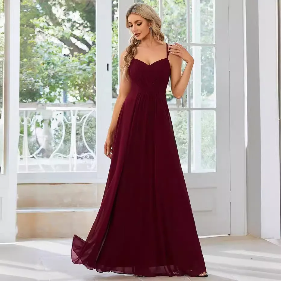 Women's sleeveless A-line long dress with pleated skirt detail in solid colour