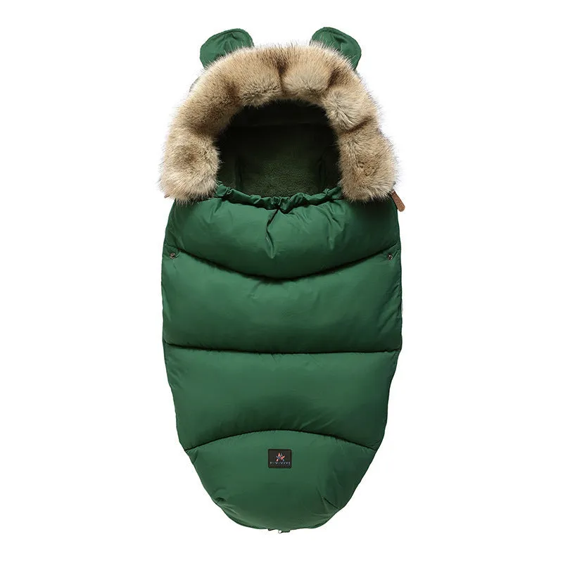 Baby warm cocoon style sleeping bag on a neutral background demonstrating solid colour design with zip closure