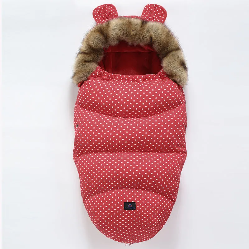Baby warm cocoon style sleeping bag on a neutral background demonstrating solid colour design with zip closure