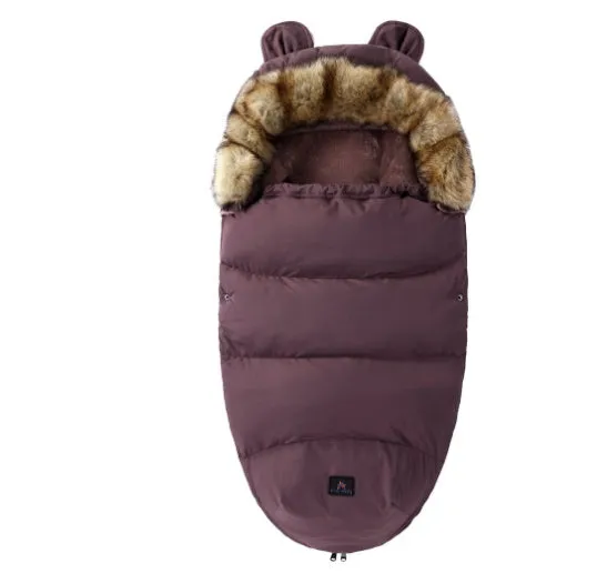 Baby warm cocoon style sleeping bag on a neutral background demonstrating solid colour design with zip closure