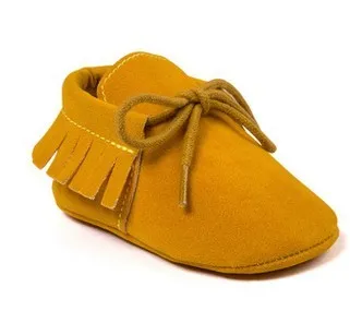 Pair of baby shoes with tassel and polychromatic sanding finish in a colourful pattern on soft sole