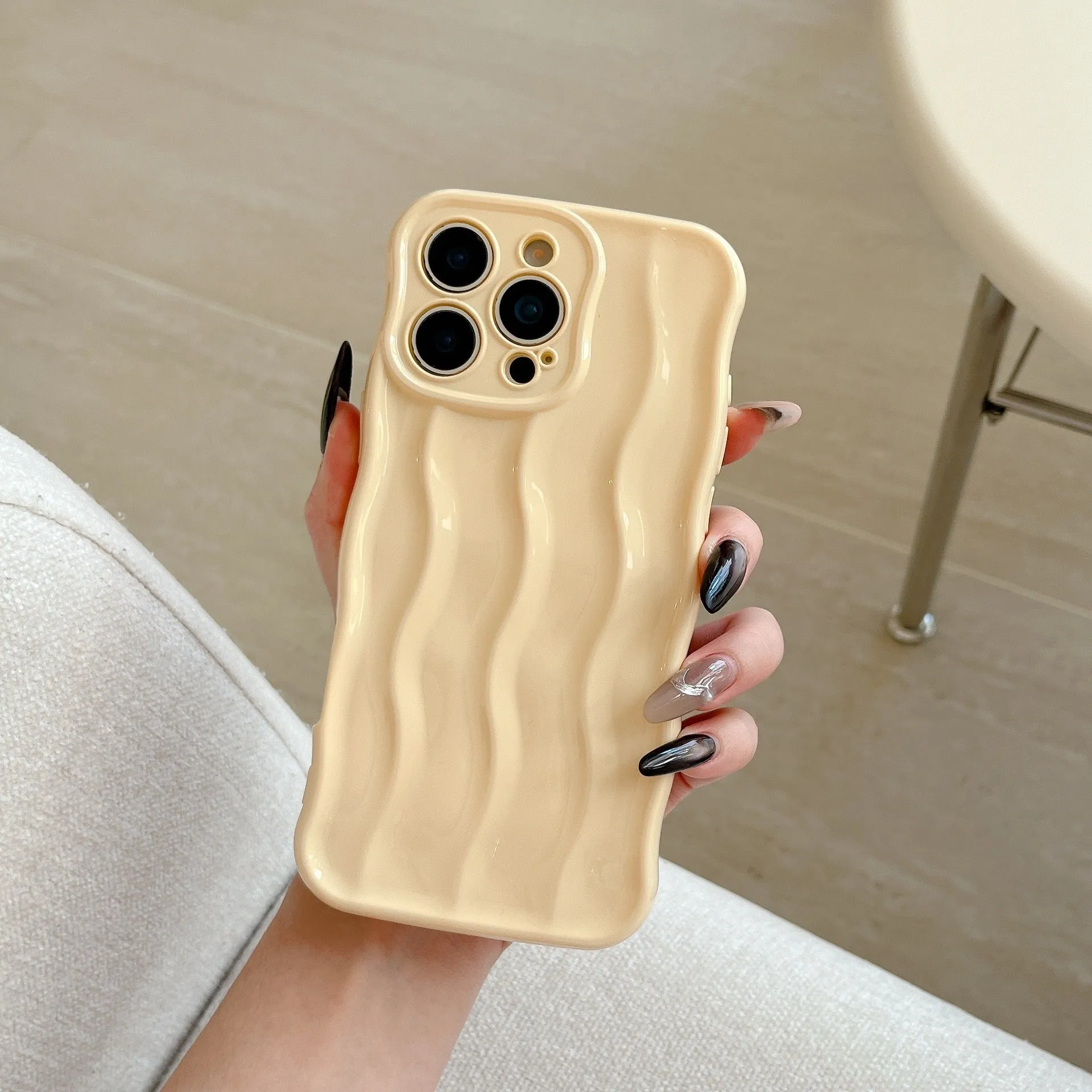 Electroplated 3D wave stripe protective case for iPhone 17 Pro Max in silver finish.