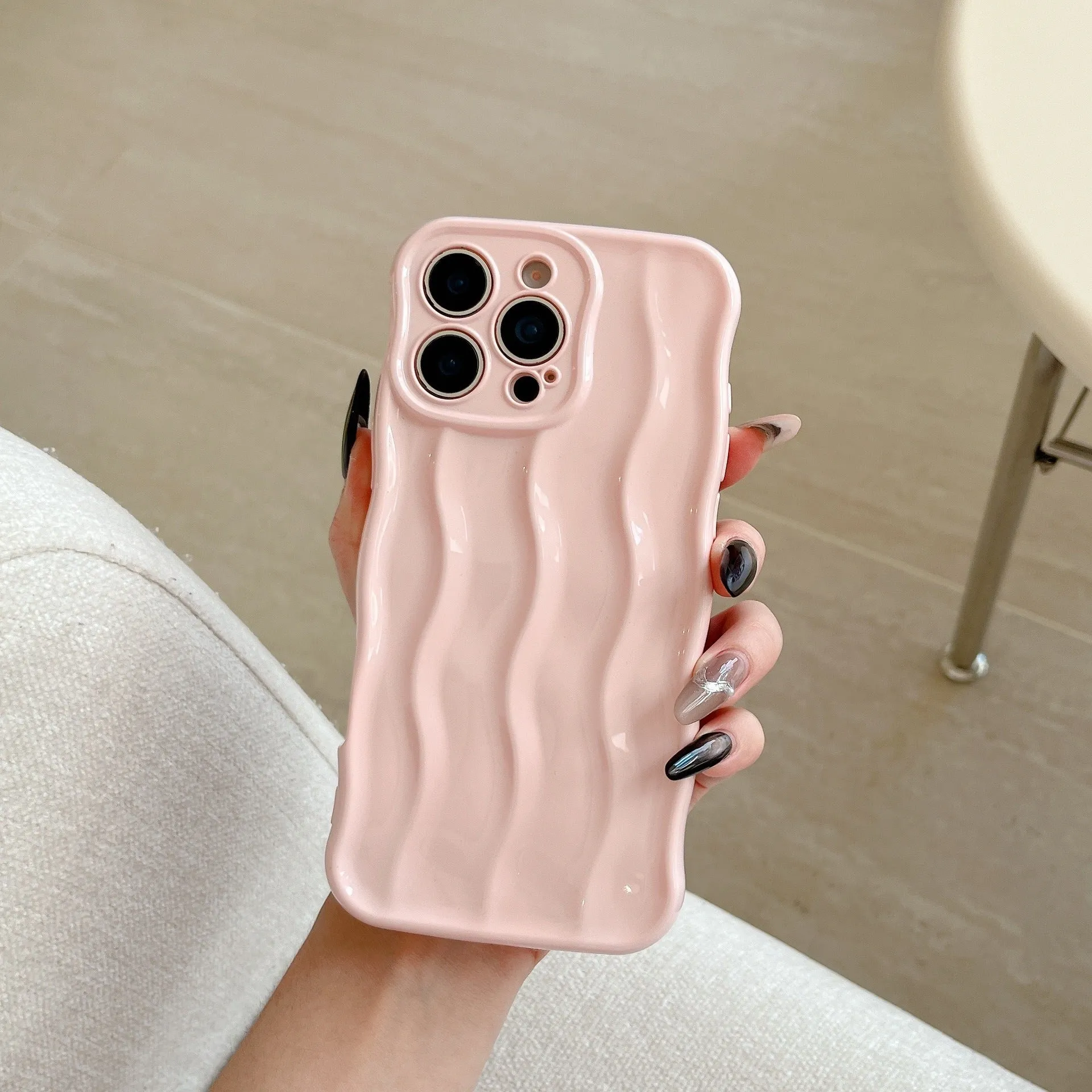 Electroplated 3D wave stripe protective case for iPhone 17 Pro Max in silver finish.