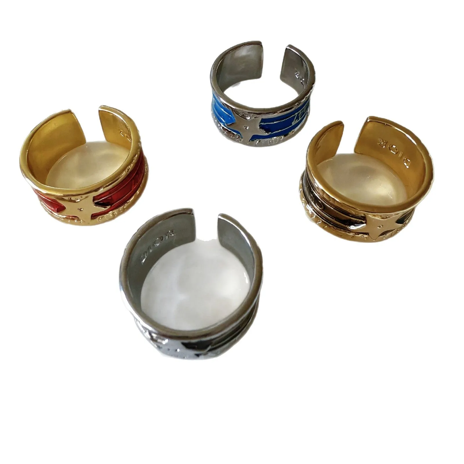 XINGX geometric oil drop ring with adjustable band and distressed finish in multiple colours.