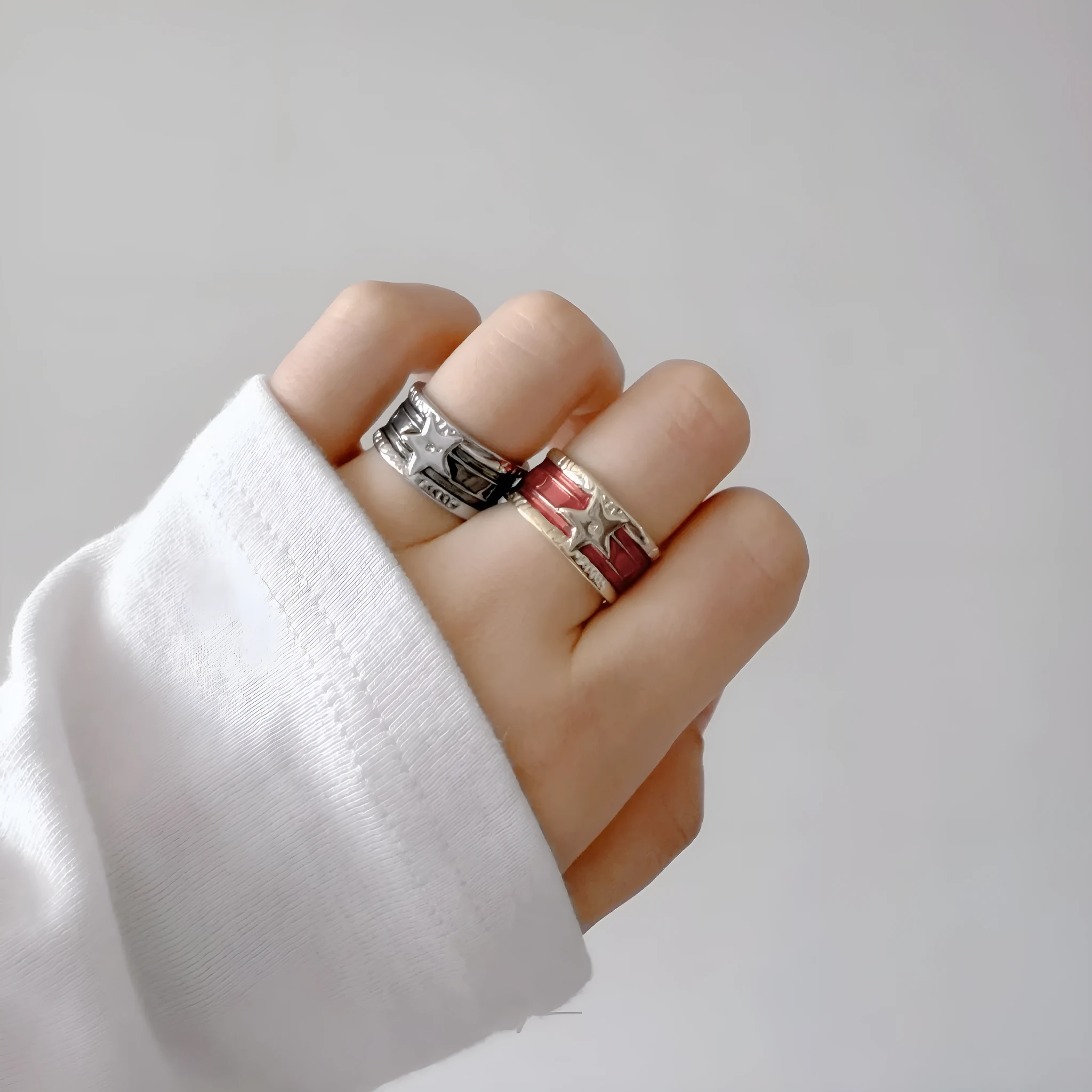 XINGX geometric oil drop ring with adjustable band and distressed finish in multiple colours.
