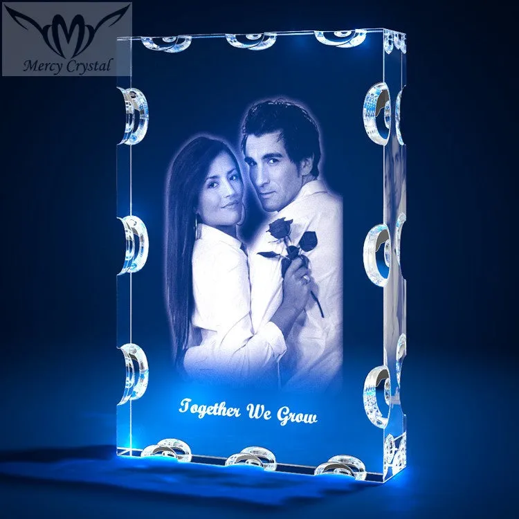 Custom laser engraved crystal sphere with personalised photo inside, available in multiple sizes and styles
