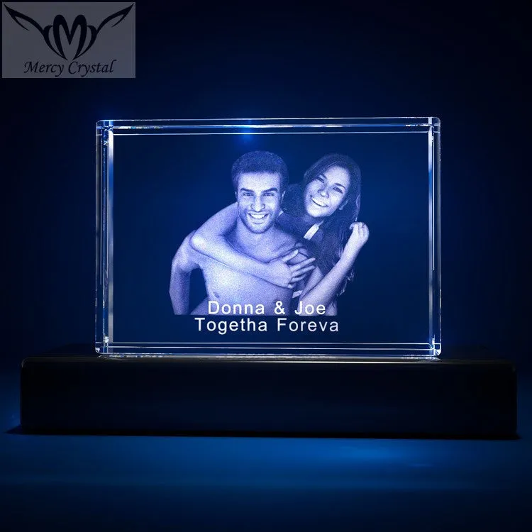 Custom laser engraved crystal sphere with personalised photo inside, available in multiple sizes and styles