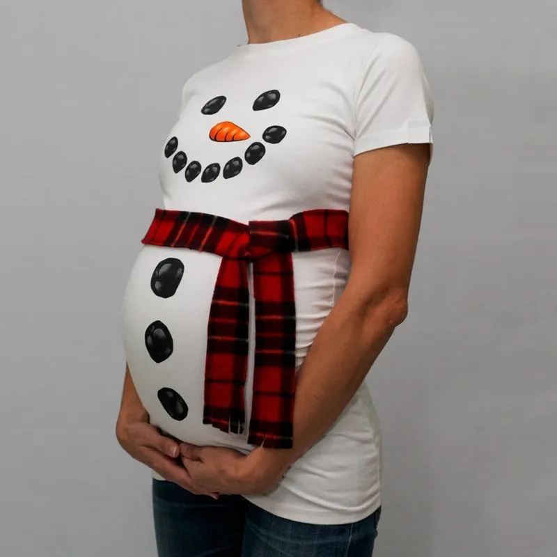 Red cartoon print maternity T-shirt with round collar and short sleeves on a woman