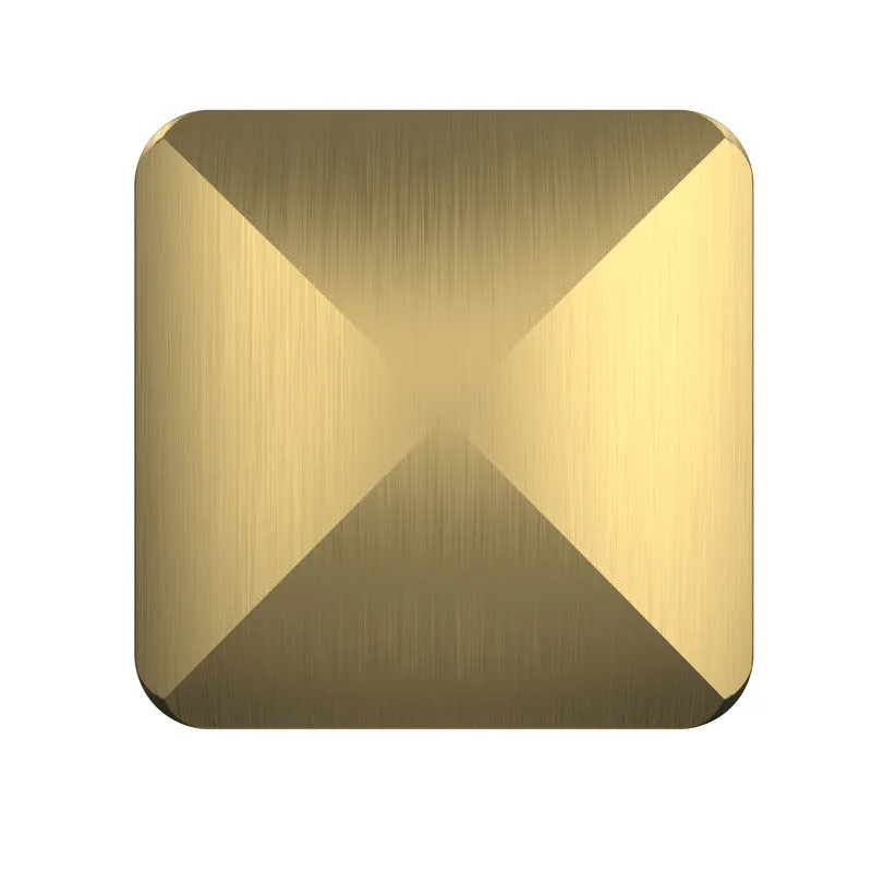 Gold hexagon stainless steel fingertip spinner stress relief toy on dark surface
