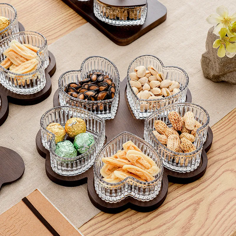 Glass serving platter with heart-shaped lids in a 4-grid configuration on a table