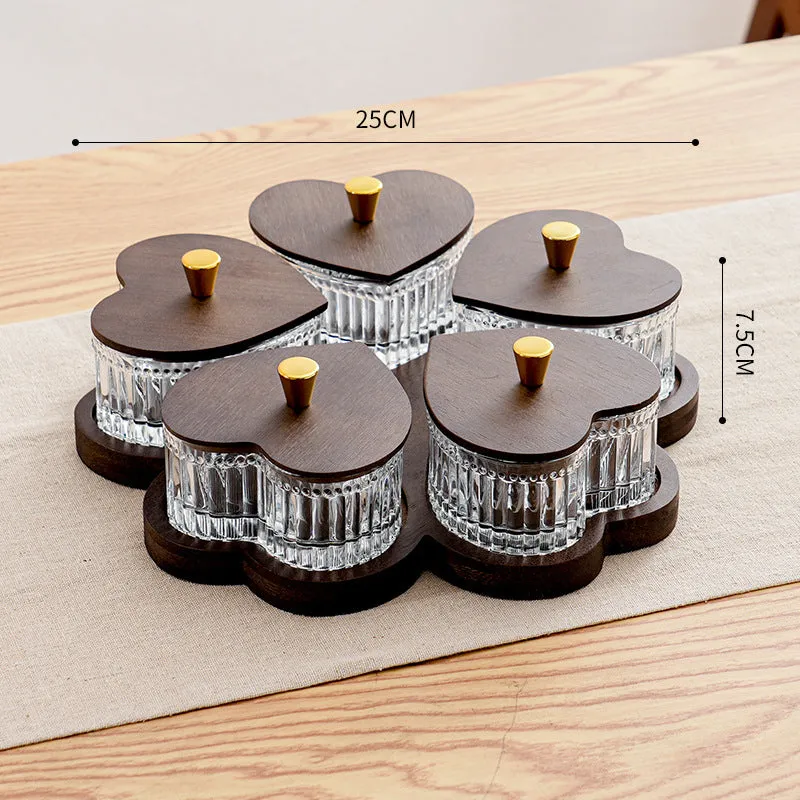 Glass serving platter with heart-shaped lids in a 4-grid configuration on a table