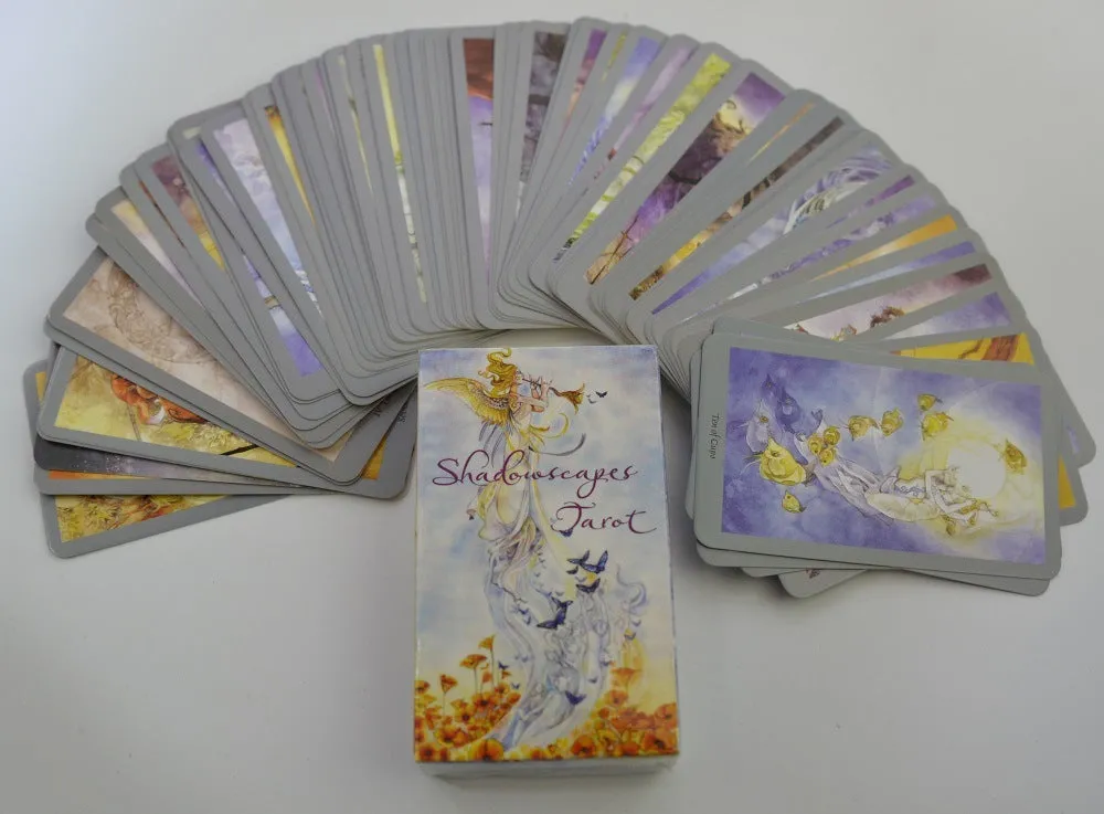 78-card tarot deck in English with black back and 49x49cm flannel tablecloth on wooden table