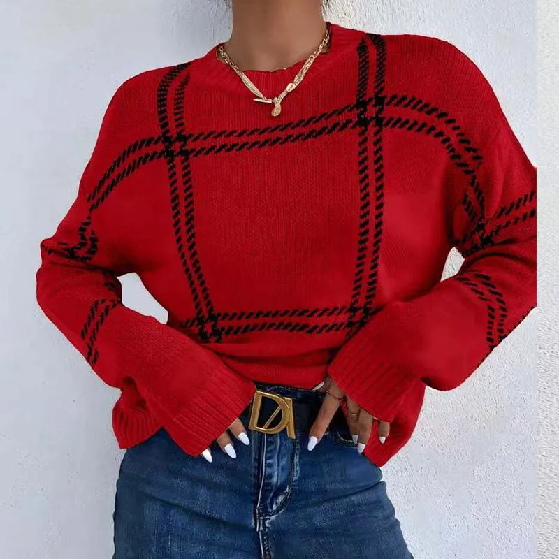 Women's loose-fit acrylic pullover sweater with a red, green, and beige plaid colour-block pattern.