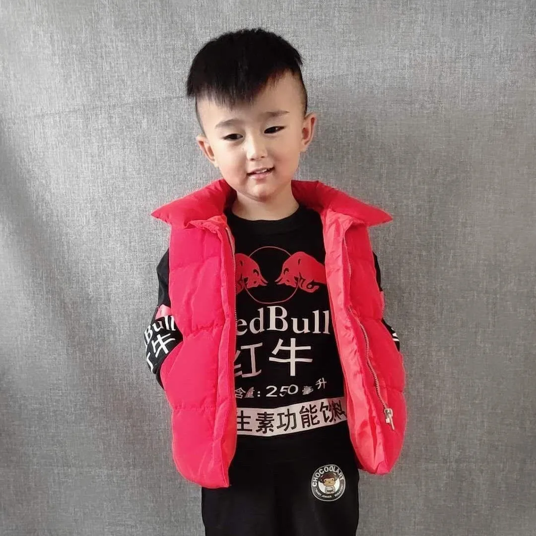 Children's down cotton vest in multicolor, with front closure, on a child, sizes 100-170cm
