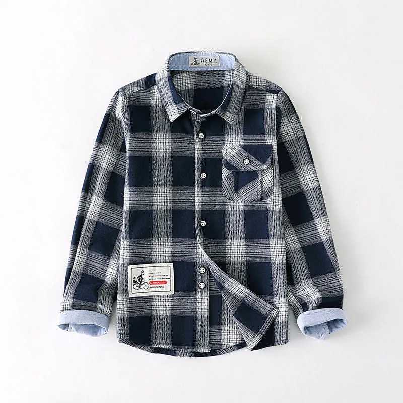 Boys plaid long-sleeve shirt in gingham grid pattern, green colour, flat lay