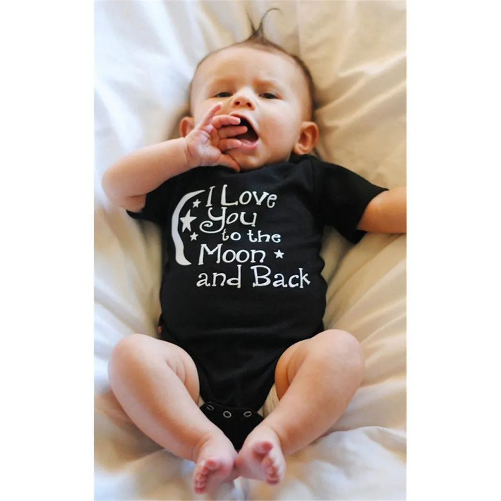 Baby boys black polyester romper with moon, star and letter print, short sleeves, triangle climbing style