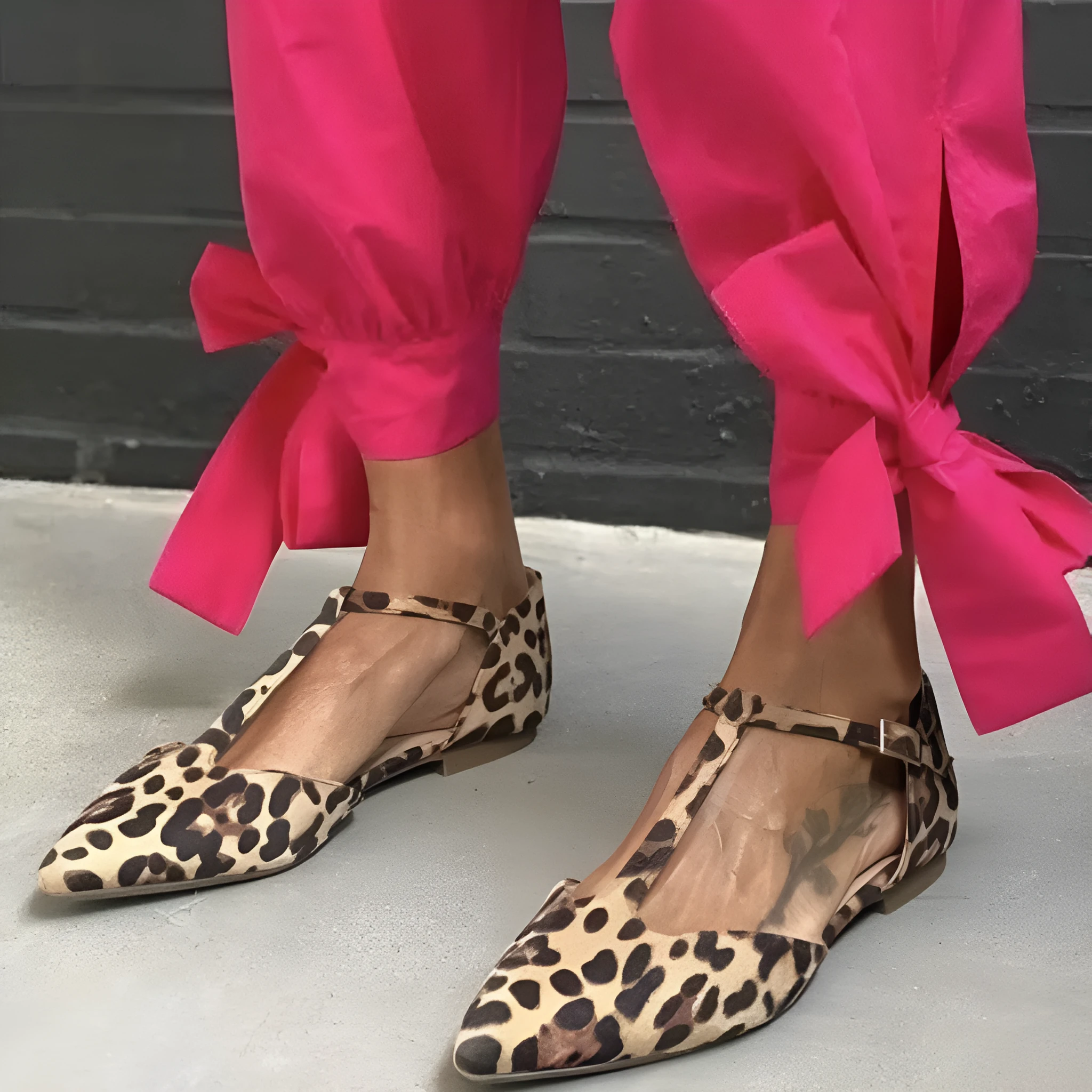 Leopard print women's pumps with pointed toe, cross straps, and low chunky heel