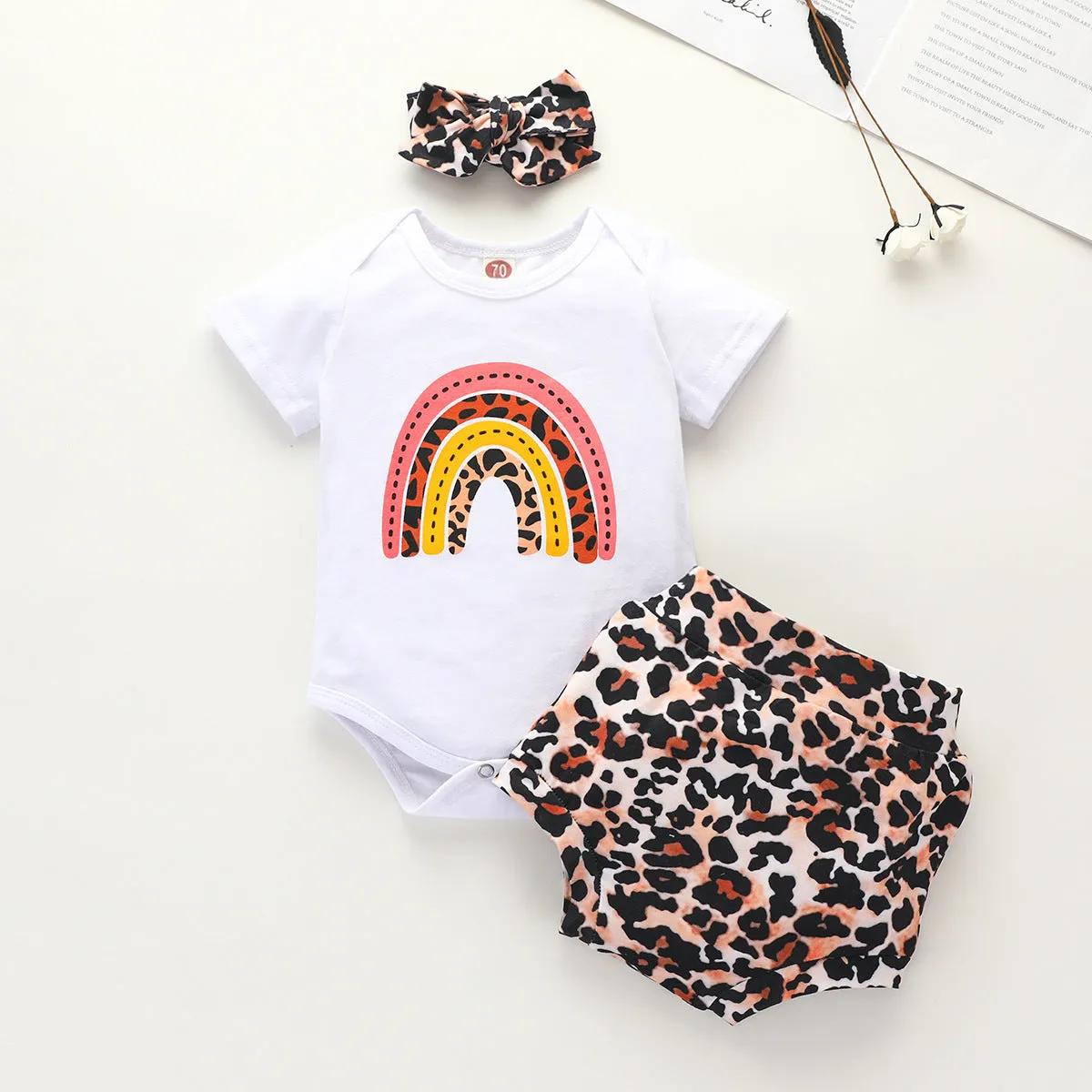 Girls' cotton rainbow romper three-piece set in beige with top, shorts, and cap, short sleeves and shorts length