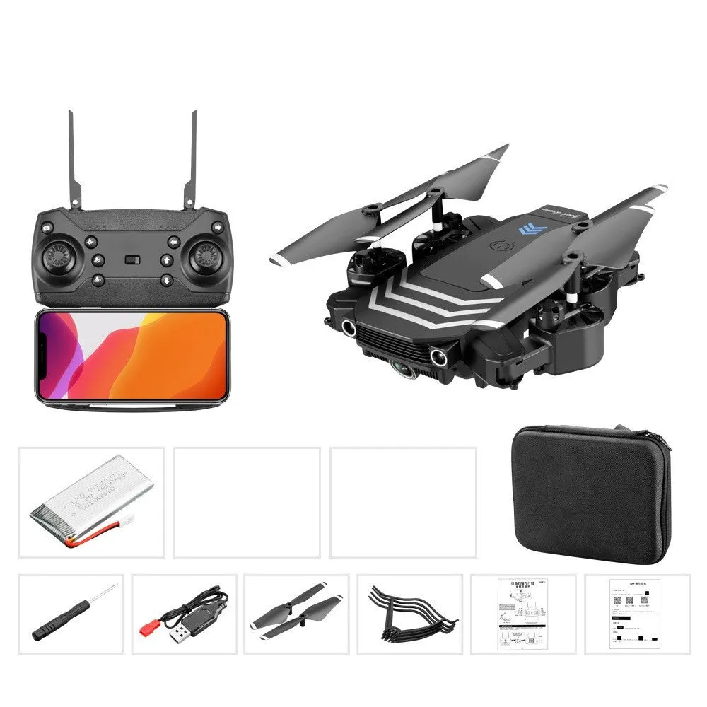 Remote control four-axis quadcopter drone with foldable arms and 4K camera, black, on a flat surface