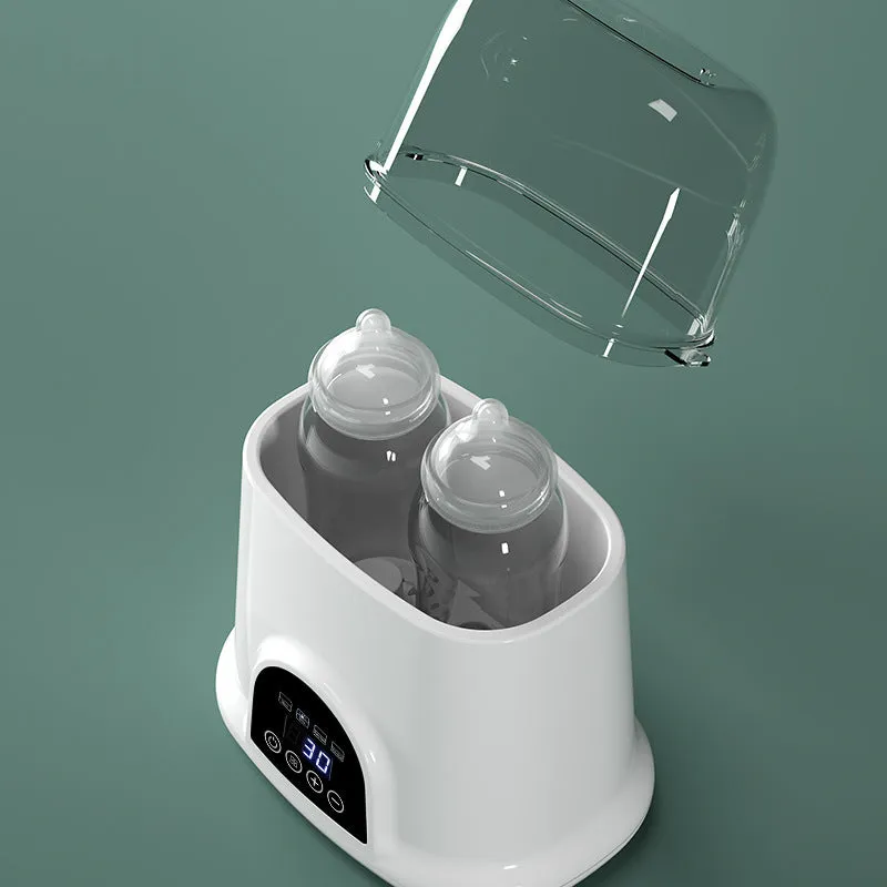Automatic thermostat milk warmer in white with touch control and steam sterilisation function