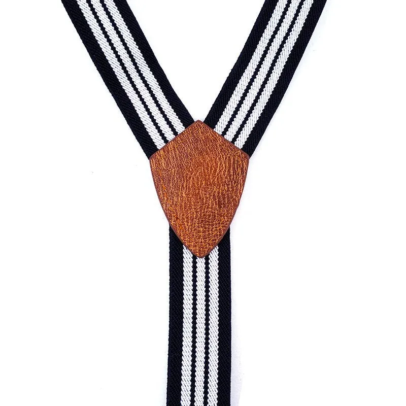 Children's wooden bow tie set with striped suspenders and belt on a boy for wedding