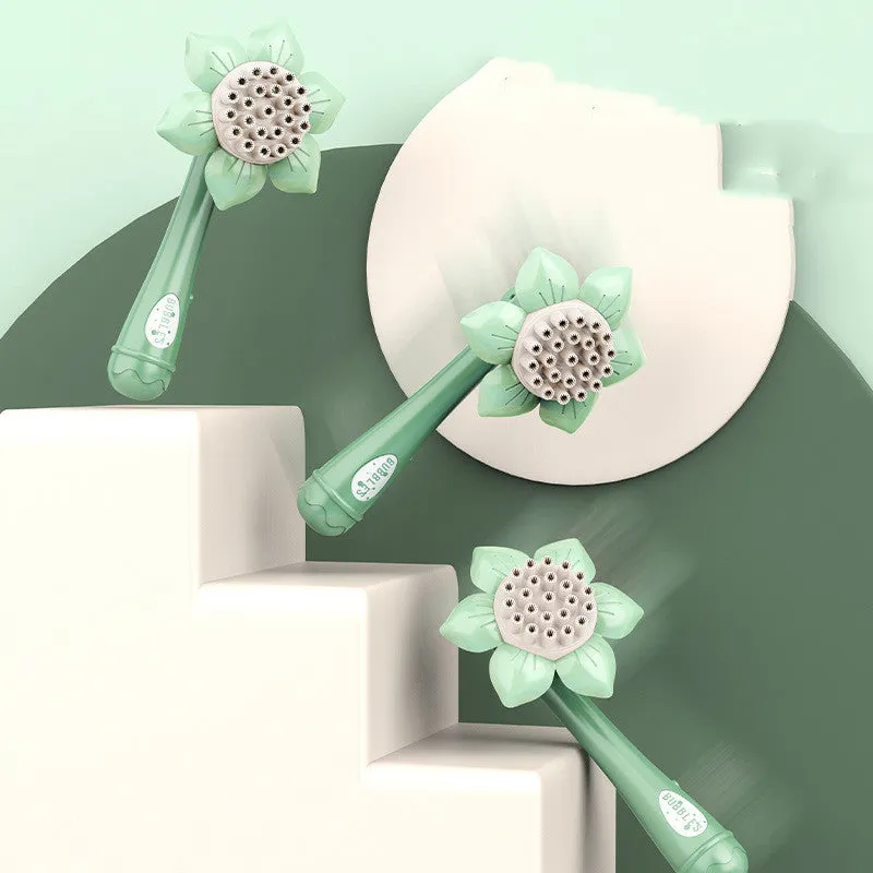 Sunflower shape plastic electric bubble blower toy in mint green colour on table
