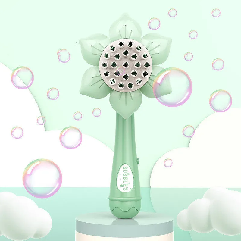 Sunflower shape plastic electric bubble blower toy in mint green colour on table