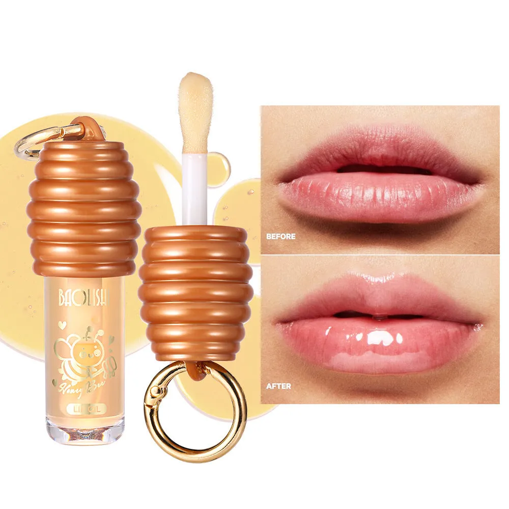 Honey lip gloss portable keychain with attached pannier bag for moisturising lip care