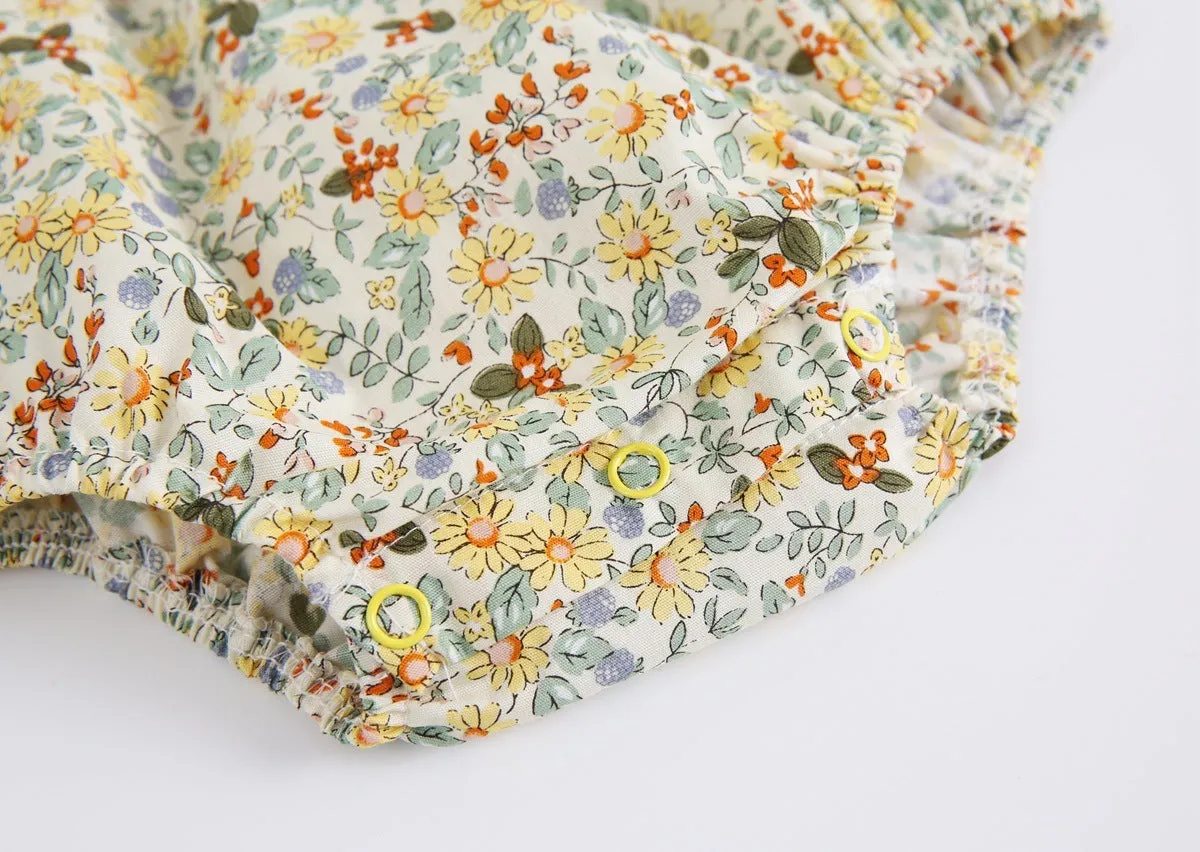 Yellow cotton floral baby romper with doll collar, triangle jumpsuit style for girls 0-6 months to 2-3 years