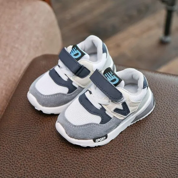 Girls running shoes with breathable mesh upper and TPR sole in grey colour
