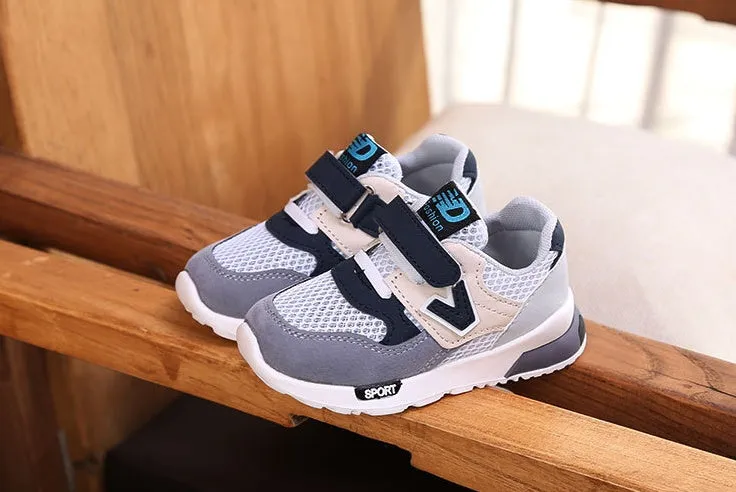 Girls running shoes with breathable mesh upper and TPR sole in grey colour