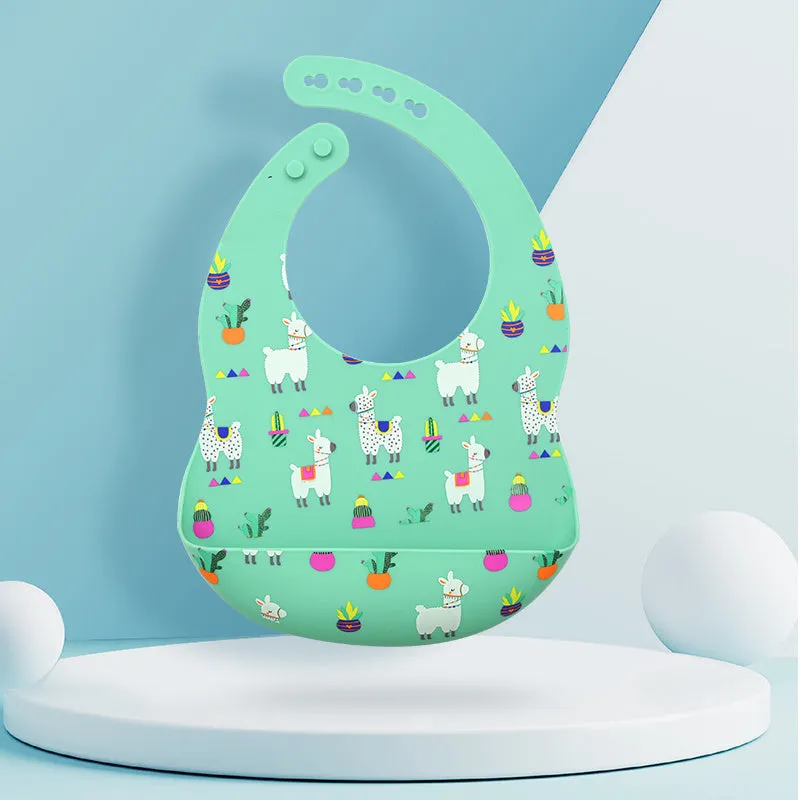 Silicone baby eating bib with adjustable neck and deep catch pocket on a child