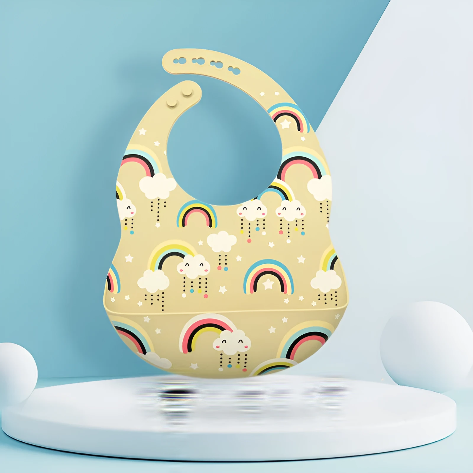 Silicone baby eating bib with adjustable neck and deep catch pocket on a child