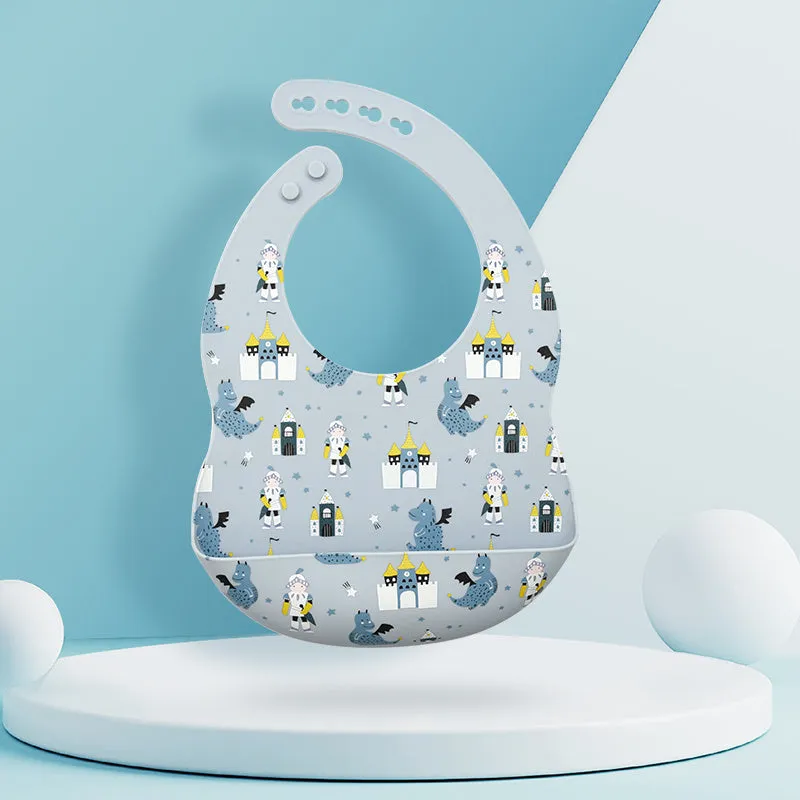 Silicone baby eating bib with adjustable neck and deep catch pocket on a child