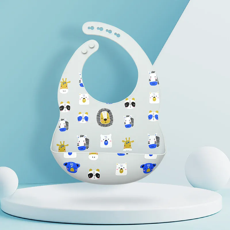 Silicone baby eating bib with adjustable neck and deep catch pocket on a child