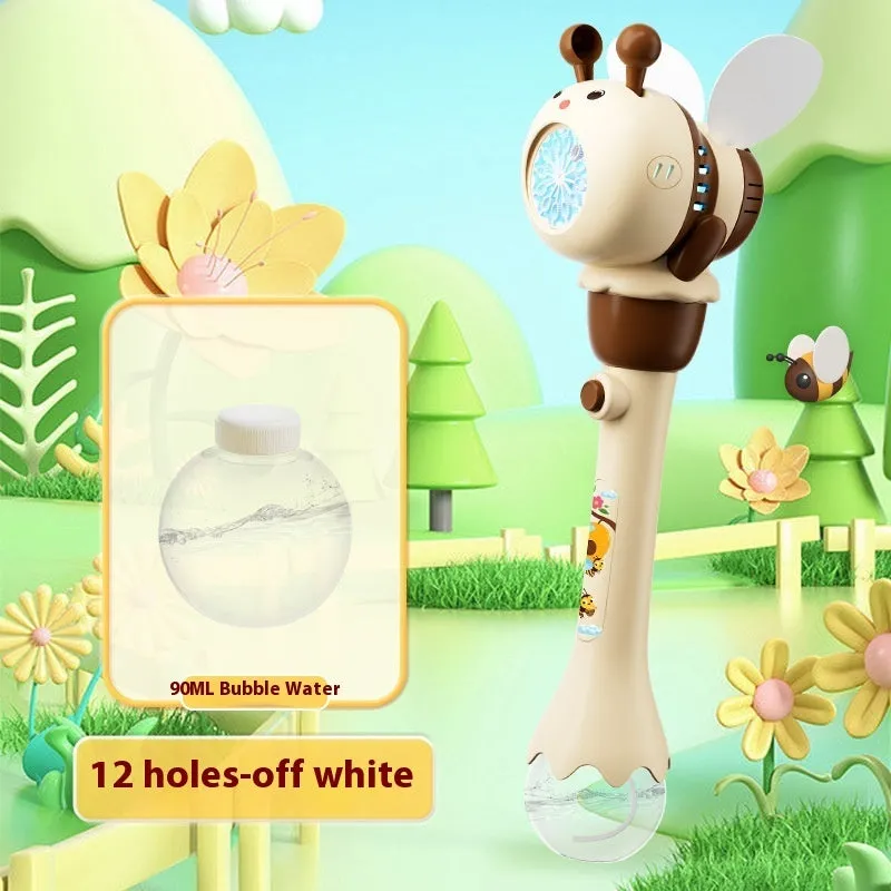 Yellow electric bee bubble machine toy with automatic lights on a flat surface