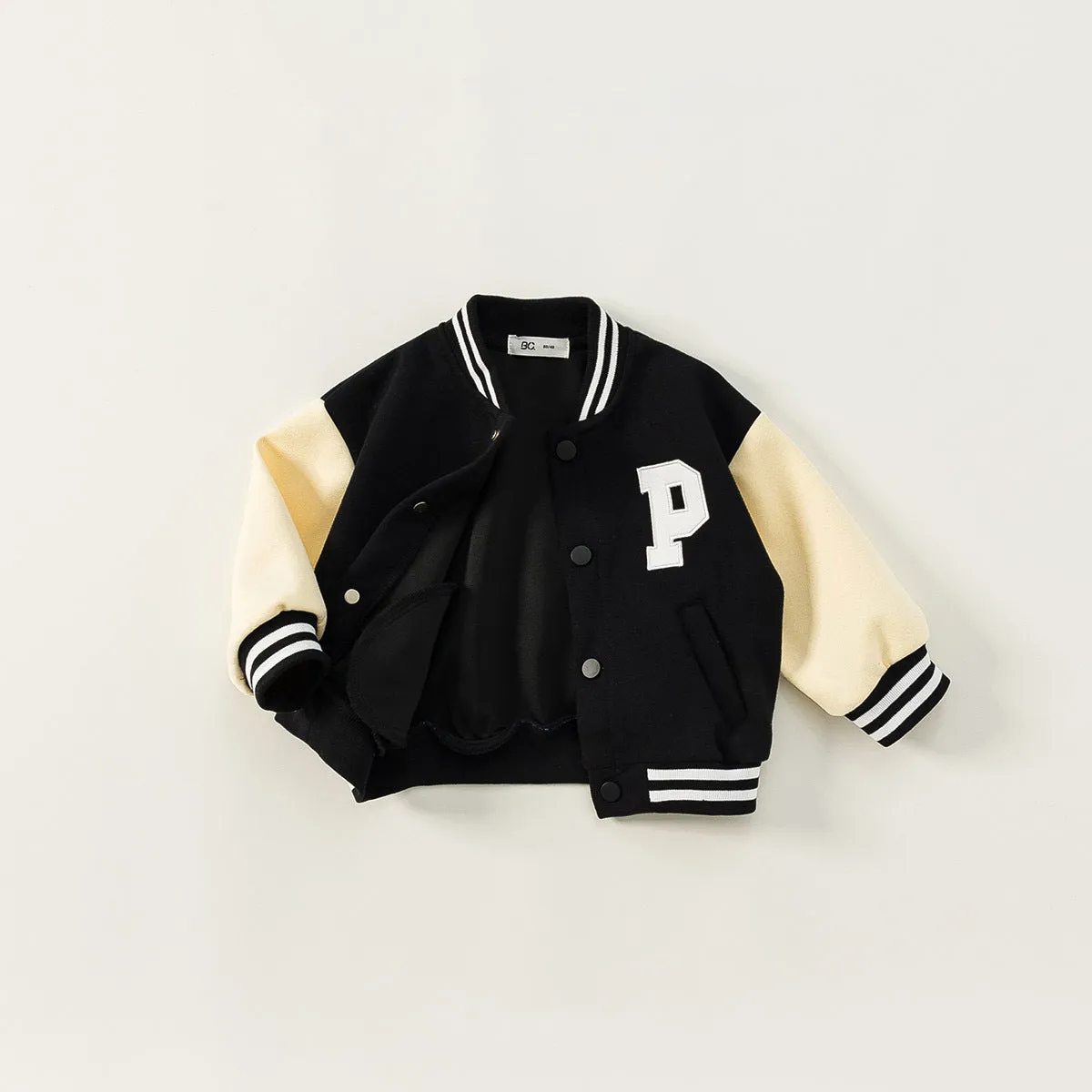 Black thickened velvet winter coat for children with round collar and letters pattern, front view