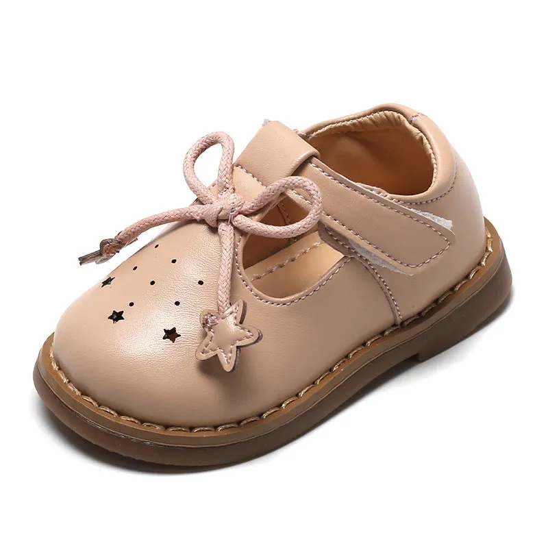Infant toddler soft sole girls shoes in black microfiber leather, breathable design, side view