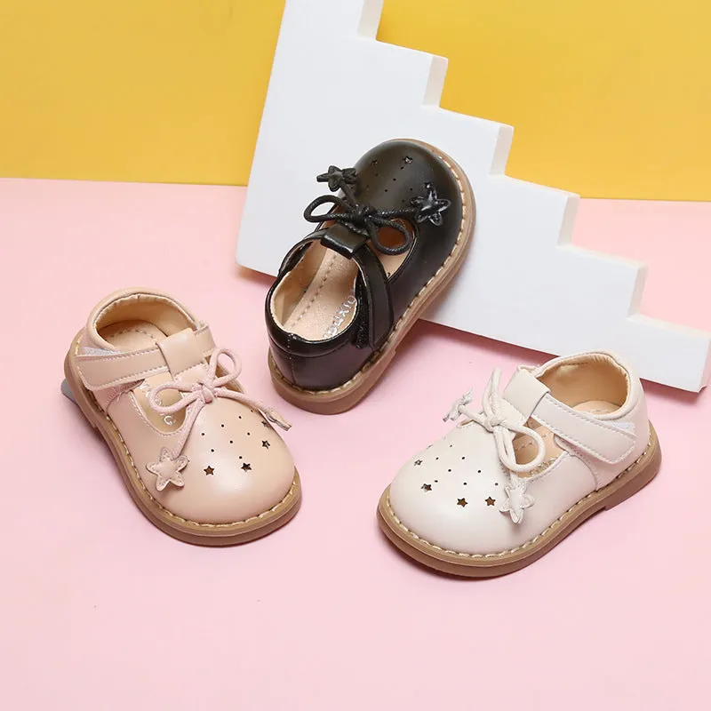 Infant toddler soft sole girls shoes in black microfiber leather, breathable design, side view