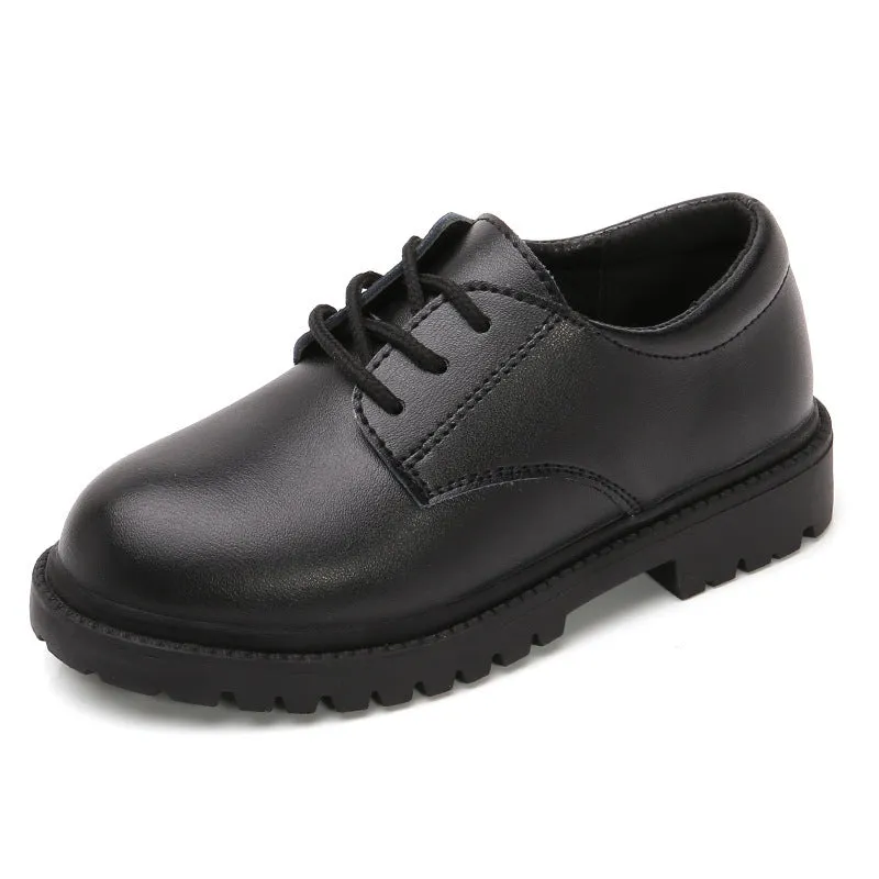 School designated black dance shoes with rubber sole and low top design for children