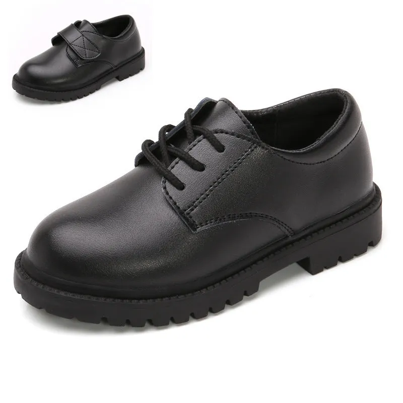 School designated black dance shoes with rubber sole and low top design for children