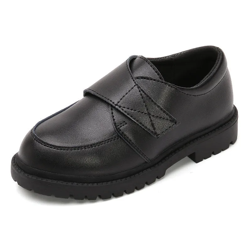 School designated black dance shoes with rubber sole and low top design for children