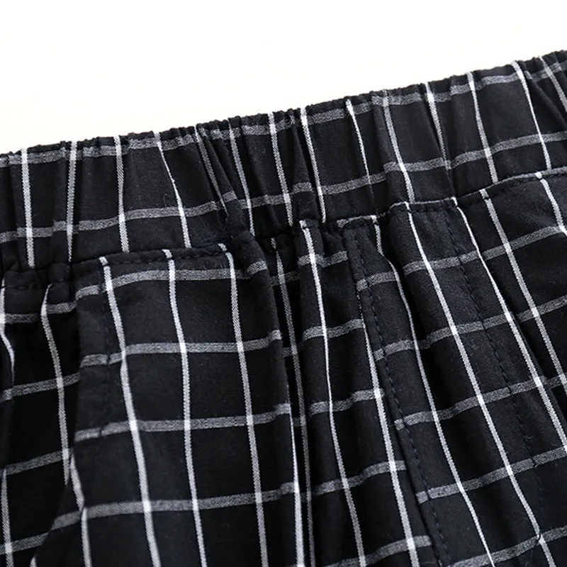 Boys casual two-piece cotton pants suit set in black with shirt and trousers on child model