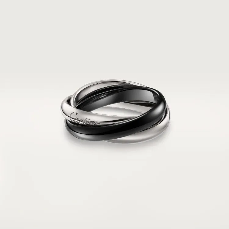 Geometric U-shaped sterling silver couple ring with three cubic zirconia stones on a hand, showing rose gold and black finish options.