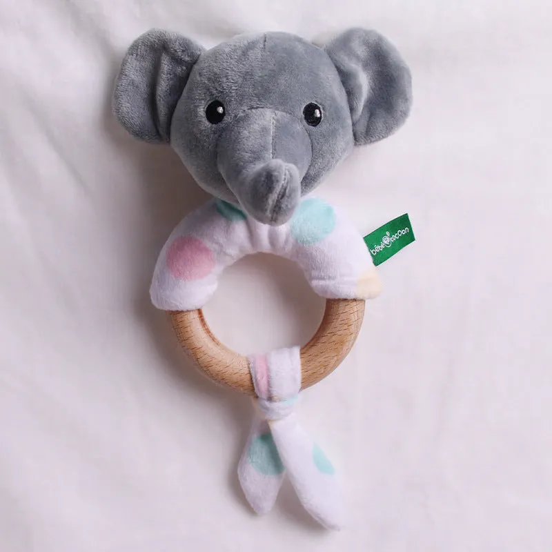 Small grey elephant plush toy with wooden ring bell for newborn babies