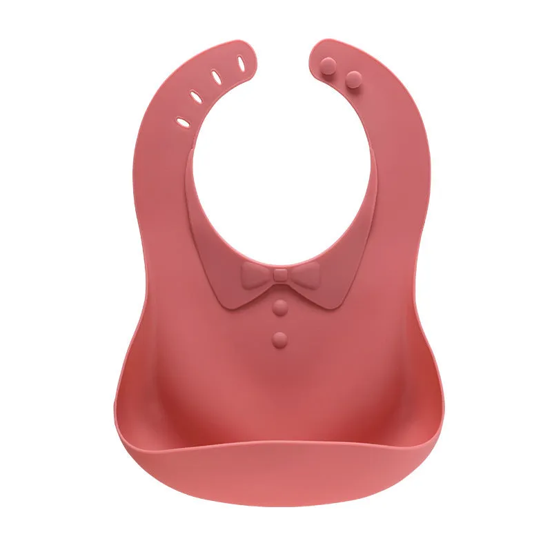 Waterproof soft plastic children bib with cartoon pattern in red, green, and blue colour options