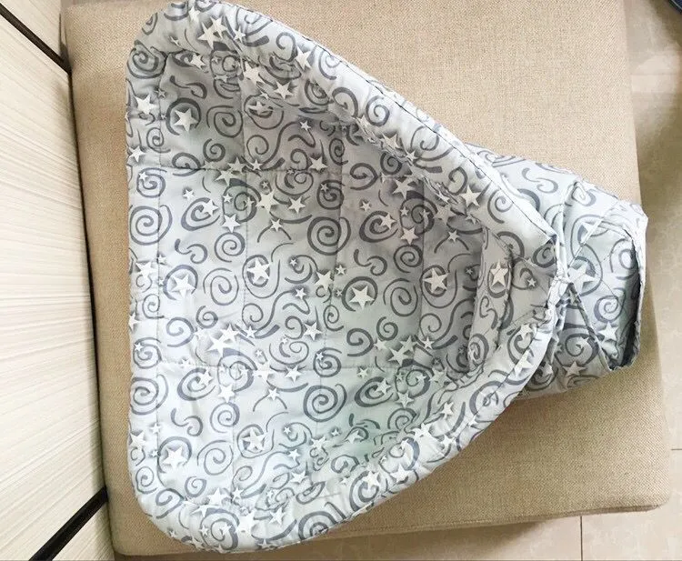 Polyester baby carrier protective blanket with dot pattern, available in small and large sizes as a drool-absorbing saliva towel.