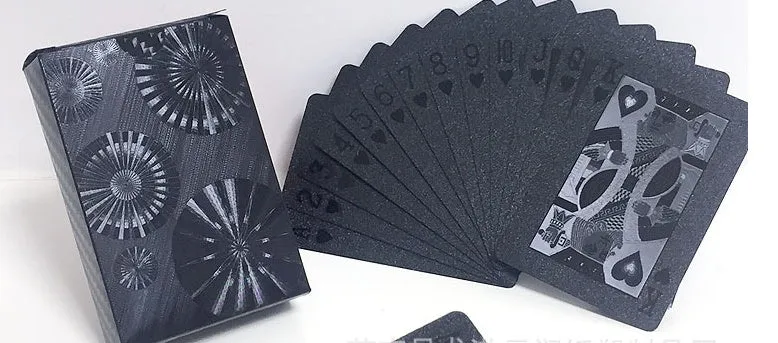 Black Diamond waterproof plastic poker cards with gold foil finish showing laser-etched diamond pattern on black background